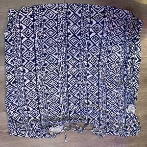 Blue and white shirt with tie in back